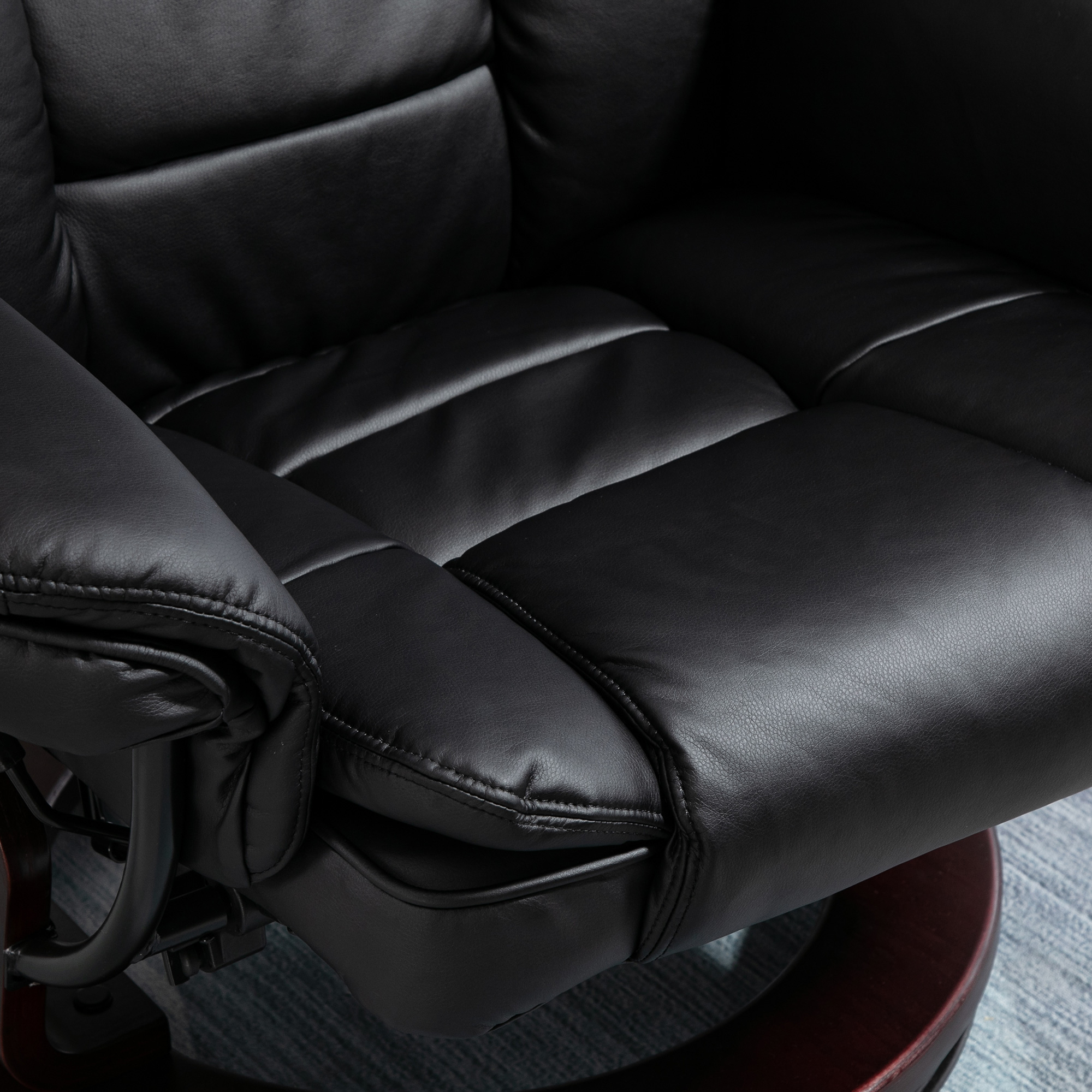 HOMCOM Recliner Chair With footstool, Recliner Armchair up to 130kg Weight Capacity, 135° Reclining Swivel Sofa Chair, PU Leather Ergonomic Couch Bed with Swivel Wood Base for Living Room, Black 7