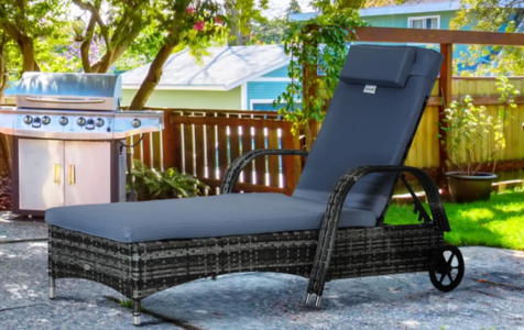 Rattan sun lounger with wheels