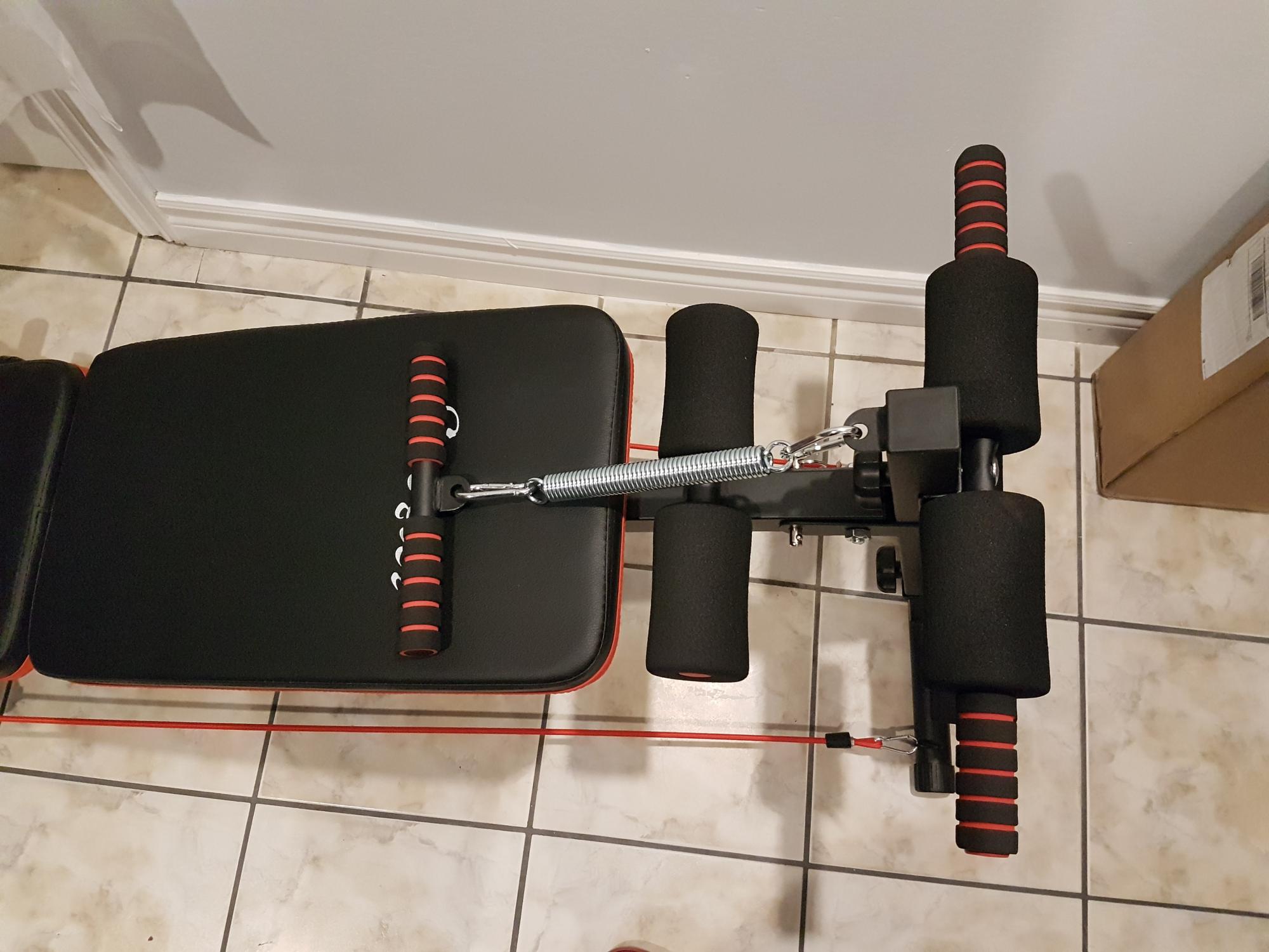 tectake® Buiktrainer 129 x 70 x 55 cm - Multifunctionele sit-up bench van staal - 5-voudig in hoogte verstelbaar, opvouwbaar, met gevoerde beenfixatie - Inclusief halters en pull cord tectake® Buiktrainer 129 x 70 x 55 cm - Multifunctionele sit-up bench van staal - 5-voudig in hoogte verstelbaar, opvouwbaar, met gevoerde beenfixatie - Inclusief halters en pull cord