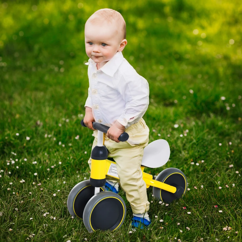 HomCom® Triciclo bicicleta sem pedais para crianças de 18 a 24 meses Amarelo 47x19x35cm