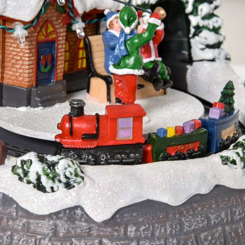 HOMCOM Village de Noël Lumineux avec Train - décoration Lumineuse de Noël - 11 lumières LED Multicolores - 8 Pistes Musicales