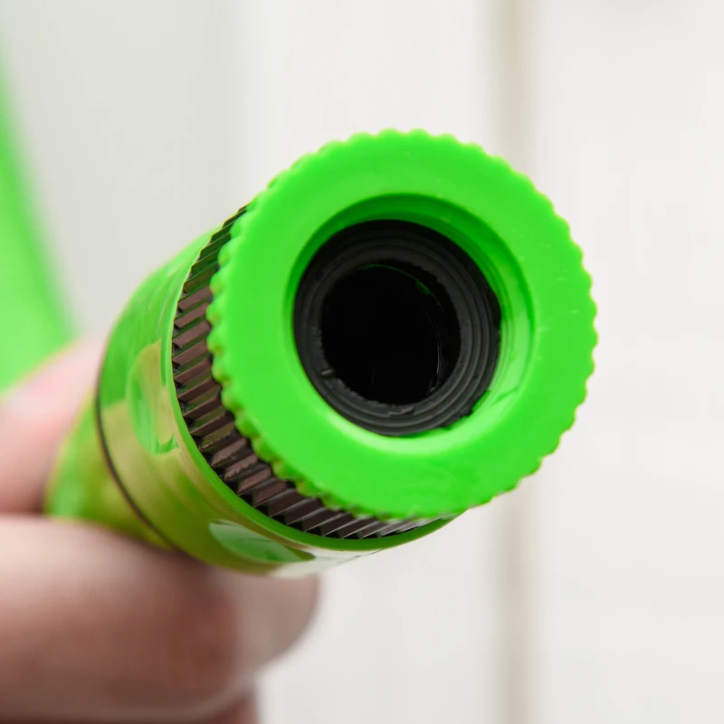 Outsunny Tubo da Giardino Estensibile da 15m con Pistola Spray a 8 Funzioni, Verde