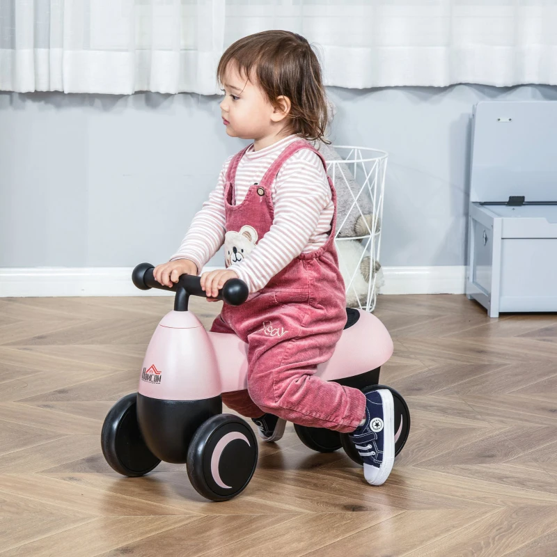 HOMCOM Correpasillos de Equilibrio para Niños Bicicleta sin Pedales Bebés de 18-36 Meses Altura Asiento de 26 cm con 4 Ruedas y Manillar Regalo de Cumpleaños 54x26x38 cm Rosa