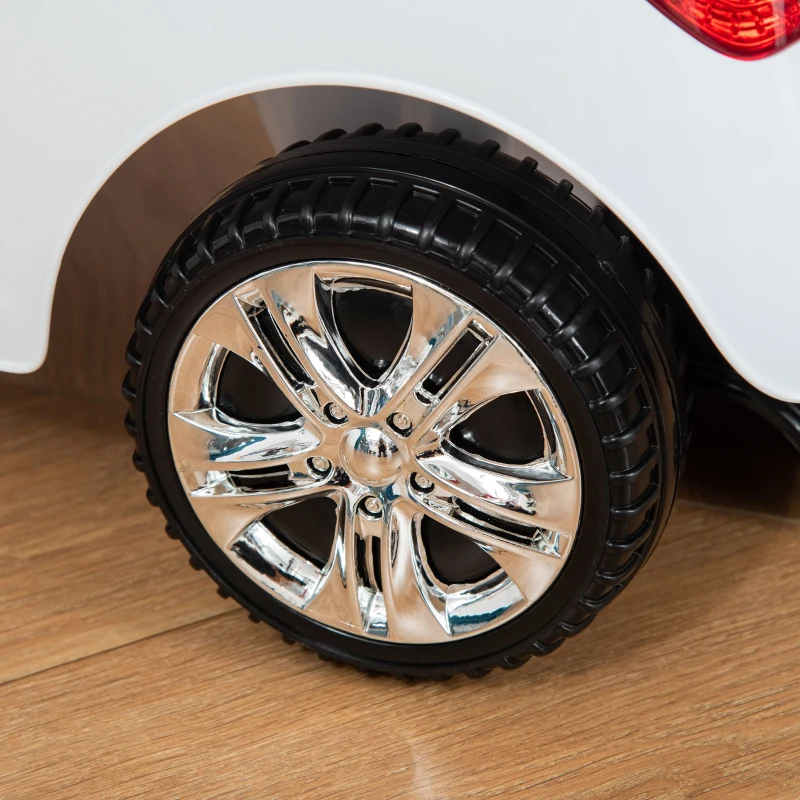 HOMCOM Coche Correpasillos para Niños de 18-36 Meses con Faros Música Bocina Volante Espacio de Almacenaje y Asa Blanco(m-9)