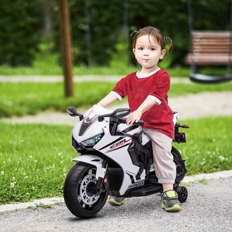 HOMCOM Motocicletă Electrică pentru Copii cu Baterie Reîncărcabilă de 6V, Viteză 3 km/h și Muzică, 90x44x52 cm, Alb(m-2)