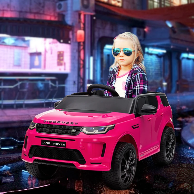 AIYAPLAY Coche Eléctrico para Niños con Licencia Land Rover Discovery Sport con Batería 12V Mando a Distancia Faros y Música Rosa