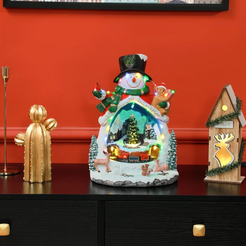 HOMCOM Weihnachtsdorf in Schneemann-Form mit fahrendem Zug, LED-Lichtern und Musik, festliche Tischdekoration, Mehrfarbig