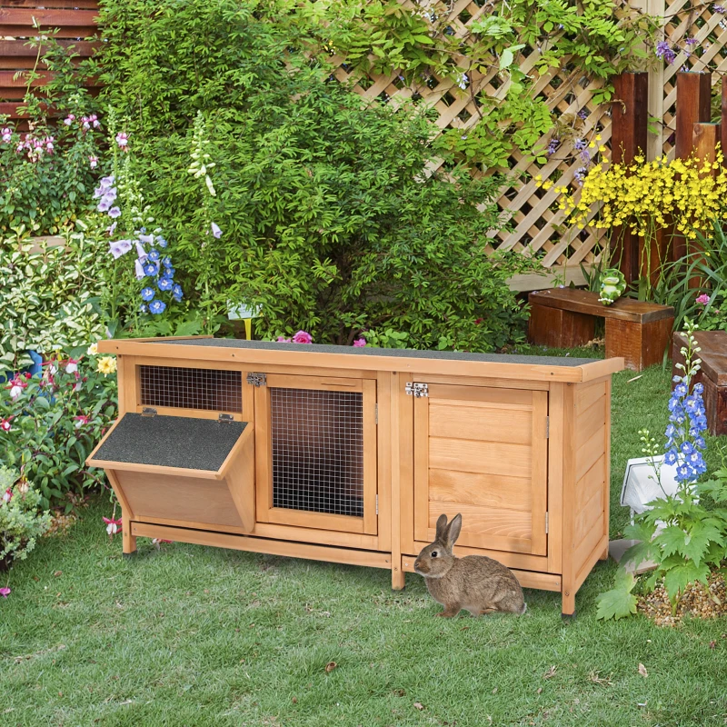 PawHut Clapier sur pied cage à lapin avec toit bitumé ouvrant 2 portes verrouillables 2 tiroirs à déjection coulissants mangeoire bois de sapin traité dim. 112L x 50l x 54H cm bois naturel et noir
