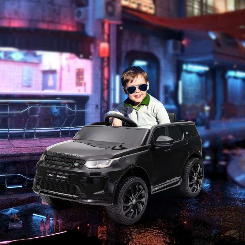 AIYAPLAY Coche Eléctrico para Niños con Licencia Land Rover Discovery Sport Batería 12V Mando a Distancia Faros y Música Negro