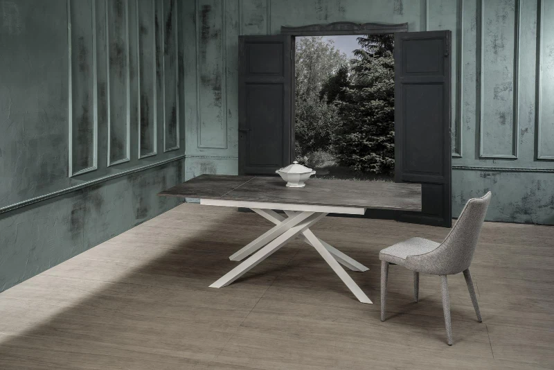 E-STYLO Tavolo allungabile con top cemento grigio in melaminico e base in metallo bianco, 90cm X 140/190cm H.76cm