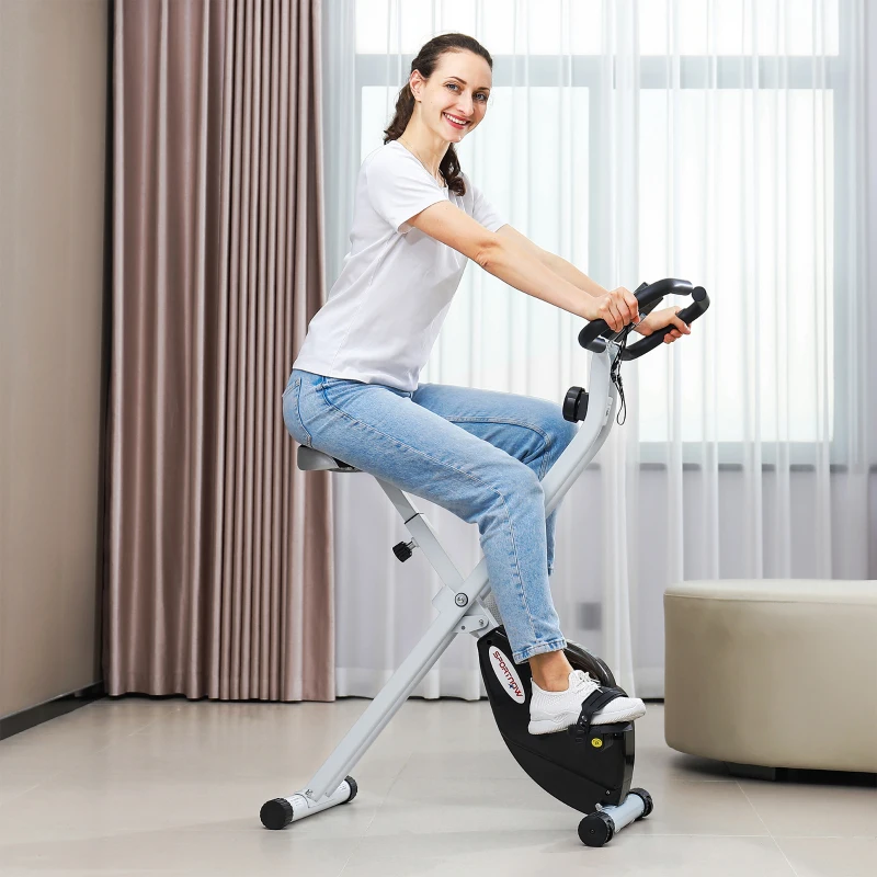 SPORTNOW Bicicleta de ejercicio plegable, silenciosa con resistencia magnética a 8 niveles, asiento ajustable, pantalla LCD, Blanco