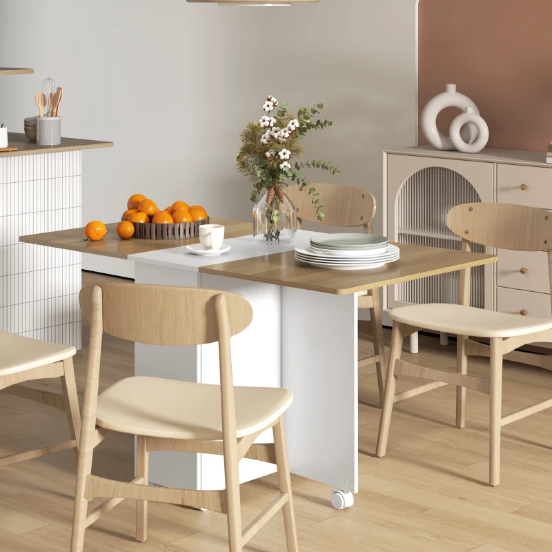 HOMCOM Table à manger pliable pour 6 personnes, table de cuisine sur roulettes avec 2 tiroirs 2 placards, 140x76x74cm, blanc