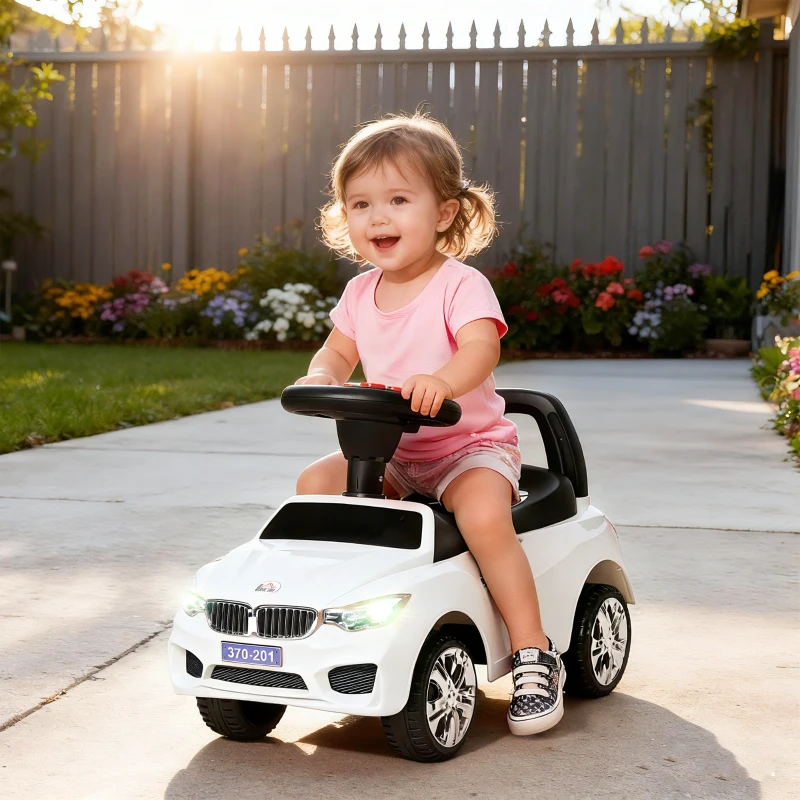 HOMCOM Porteur enfants voiture, véhicule à pousser avec coffre à jouets, klaxon, phares et musique, 63,5 x 28 x 36 cm, blanc