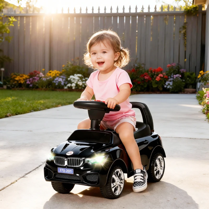 HOMCOM Carro Andador para Crianças com Faróis Música Buzina Volante Compartimento de Armazenamento 63,5x28x36 cm Preto