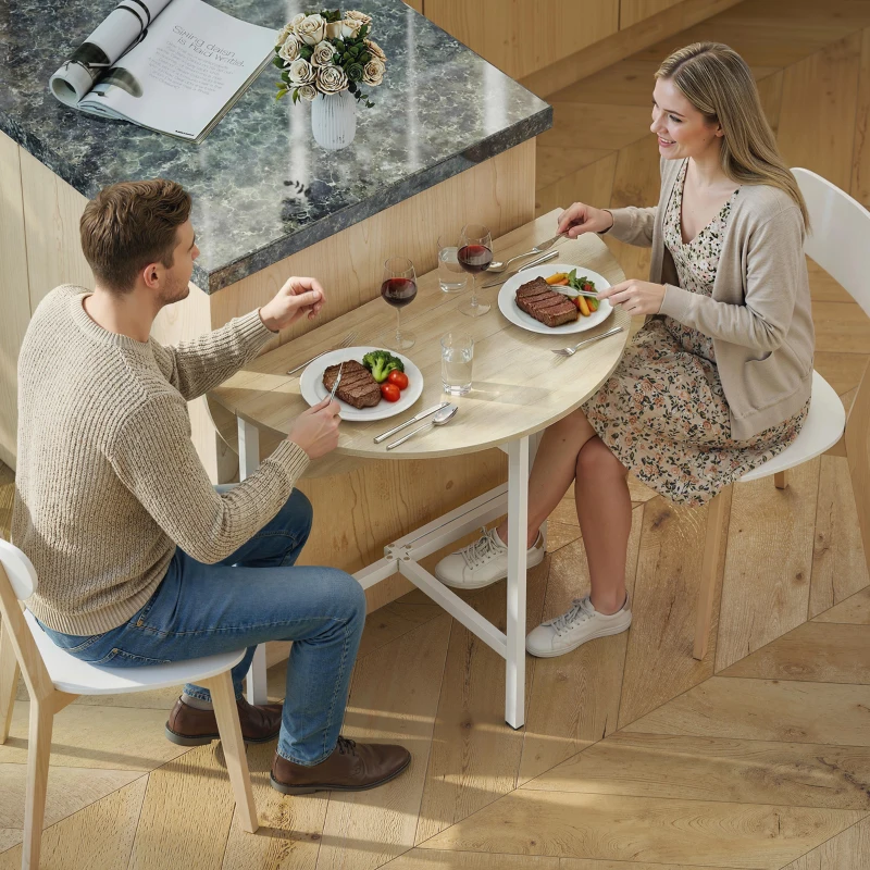 HOMCOM Mesa de comedor plegable, mesa redonda plegable de 80 cm con armazón de acero, capacidad para 2-4 personas, acabado madera natural