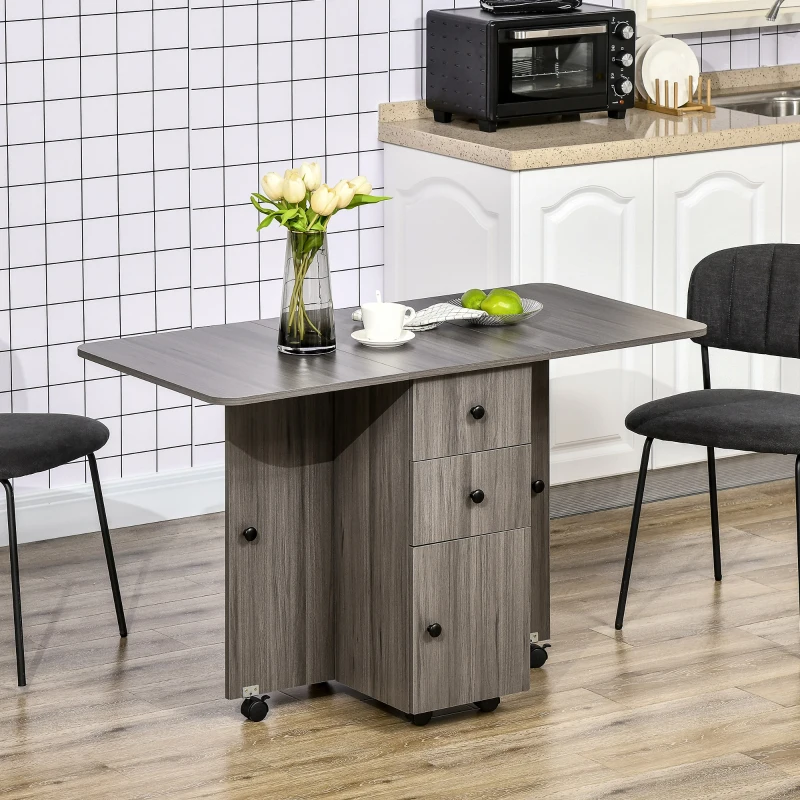 HOMCOM Table de cuisine pliable table à manger pliante 2 plateaux rabattables avec 2 tiroirs 1 placard gris