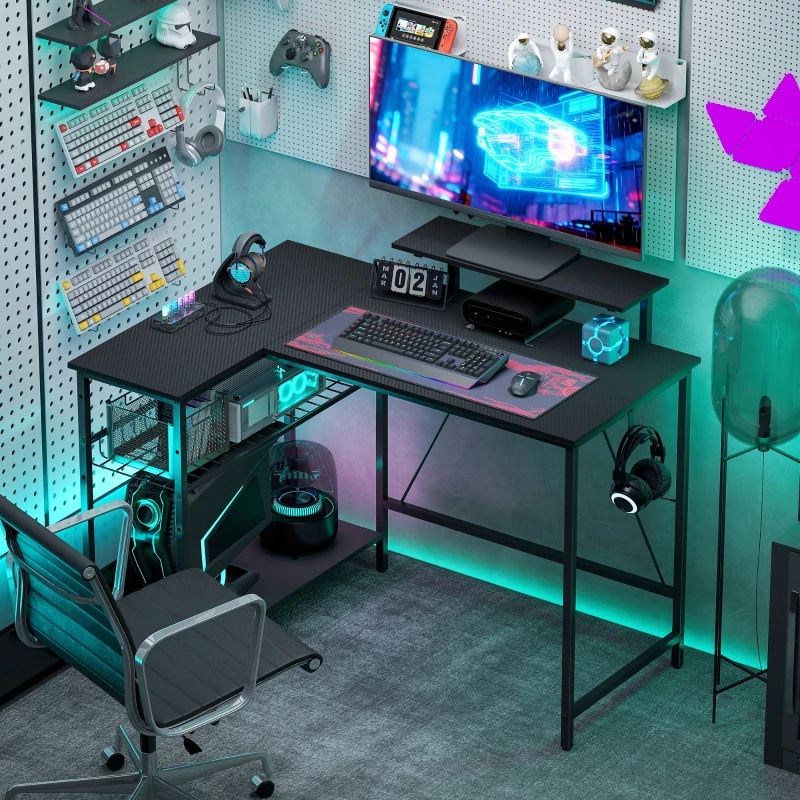 HOMCOM Bureau gaming réversible, bureau gaming d'angle, support pour écran, étagère en maille réglable, 114,5x82x91,5cm, noir