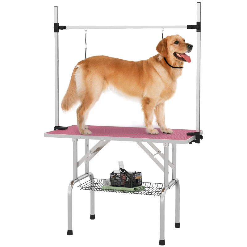 PawHut Mesa de Peluquería Canina Plegable con Cesta Metálica Barra de Acero Inoxidable Ajustable 107x60x164 cm Rosa