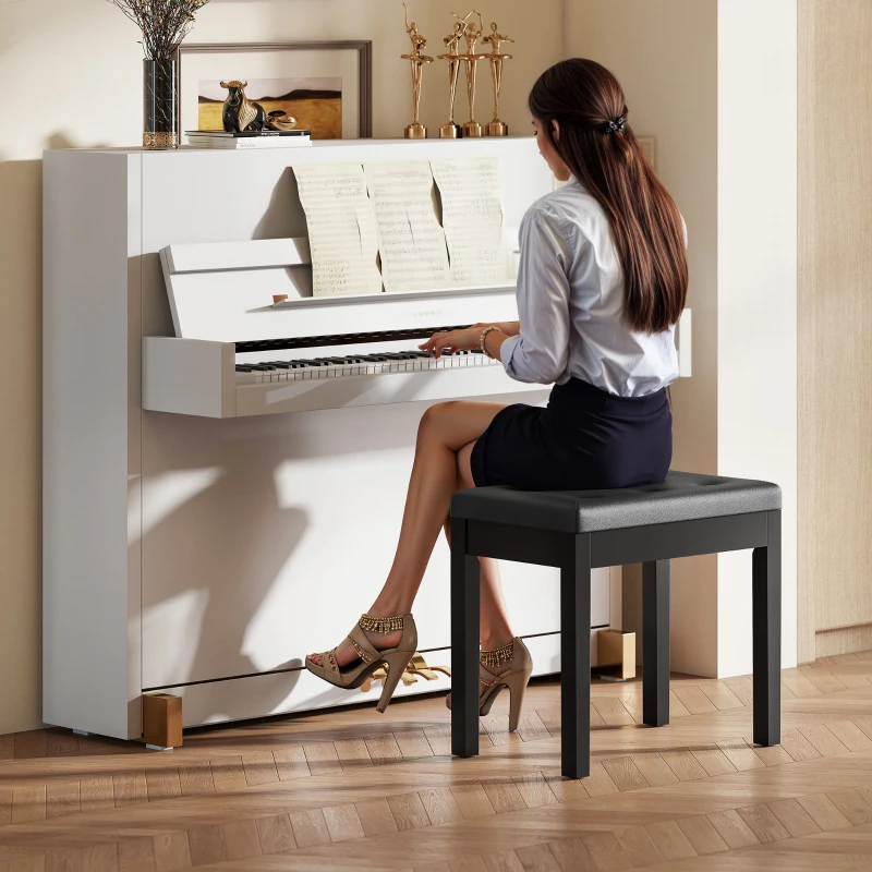 HOMCOM Banco de piano, revestimento em couro sintético, botões capitonê, compartimento de armazenamento, pés de madeira, Preto