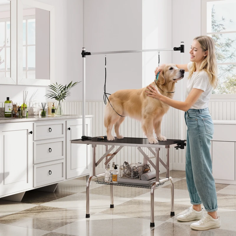 PawHut Mesa de Peluquería para Mascotas Mesa de Aseo Plegable con Estante de Almacenamiento Altura Ajustable 20-80 cm 107x60x170 cm Negro