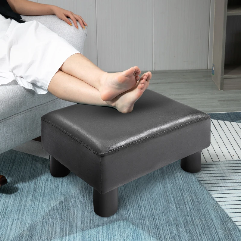 HOMCOM Reposapiés para Sofá Taburete Pequeño Tapizado en Piel Sintética Asiento de Espuma y Patas de Plástico 40x30x24 cm Negro