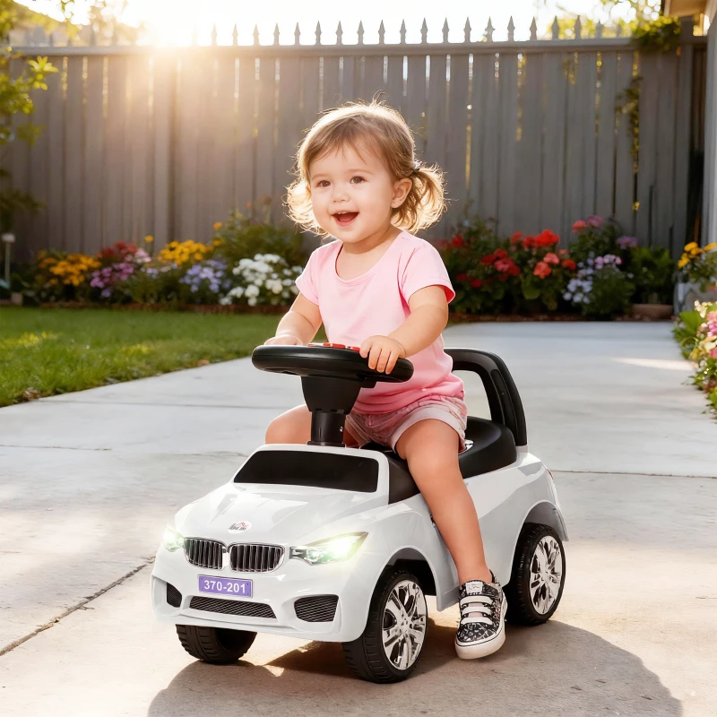 HOMCOM Porteur enfants voiture, véhicule à pousser avec coffre à jouets, klaxon, phares et musique, 63,5 x 28 x 36 cm, blanc