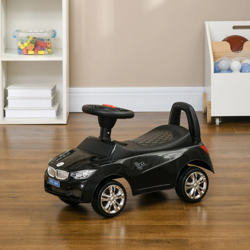 HOMCOM Porteur enfants voiture, véhicule à pousser avec coffre à jouets, klaxon, phares et musique, 63,5 x 28 x 36 cm, noir(m-10)