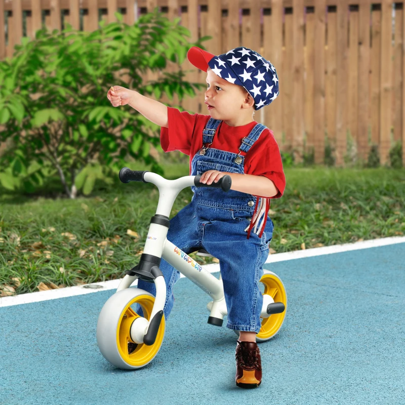 AIYAPLAY Bicicleta de Equilibrio Infantil +18 Meses con Asiento Ajustable en Altura Carga 25 kg 66,5x34x47 cm Blanco y Naranja