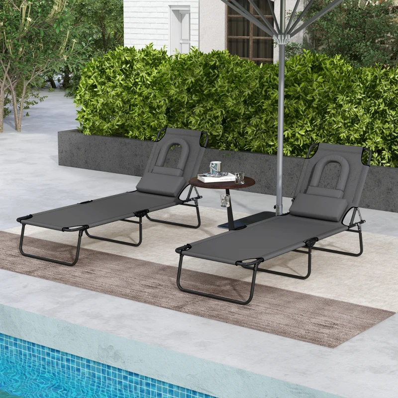 Outsunny Folding Sun Loungers Set of 2 with Face Hole, 4-Position Adjustable Backrest Garden Recliner Chair Sunbed, Outdoor Lounge Chair with 500 D Oxford Cloth Seat, Pillow for Beach, Dark Grey