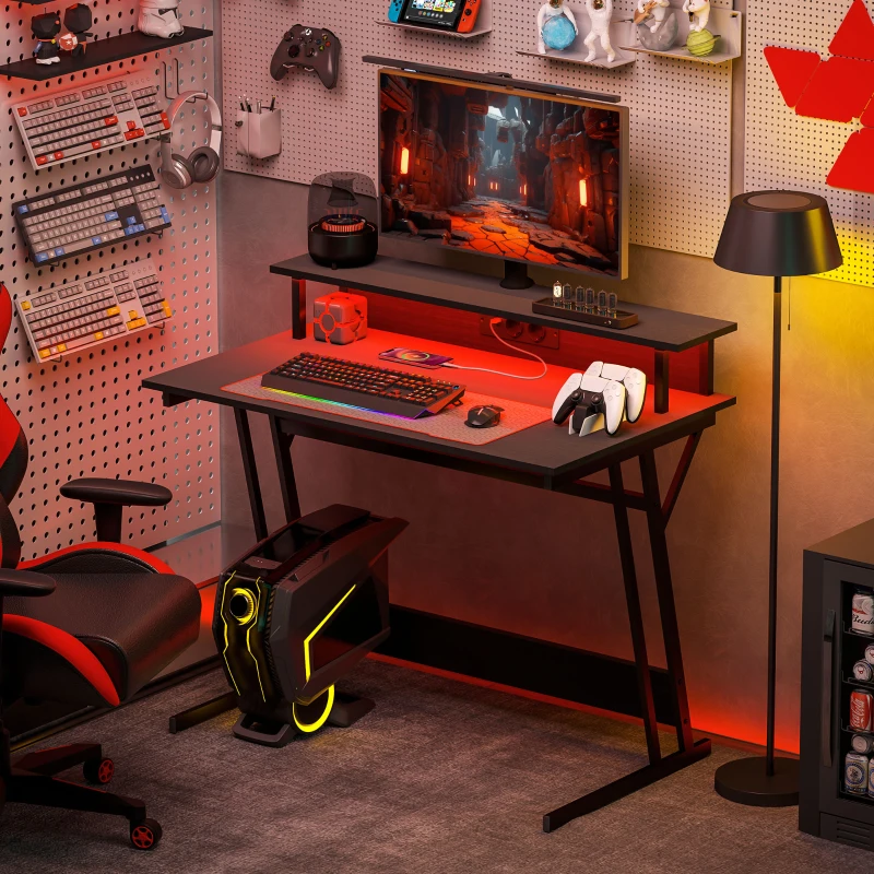 HOMCOM Escritorio Gaming con Luces LED 100x60 cm omas de Corriente Soporte para Monitor Estantes y Control Remoto Negro