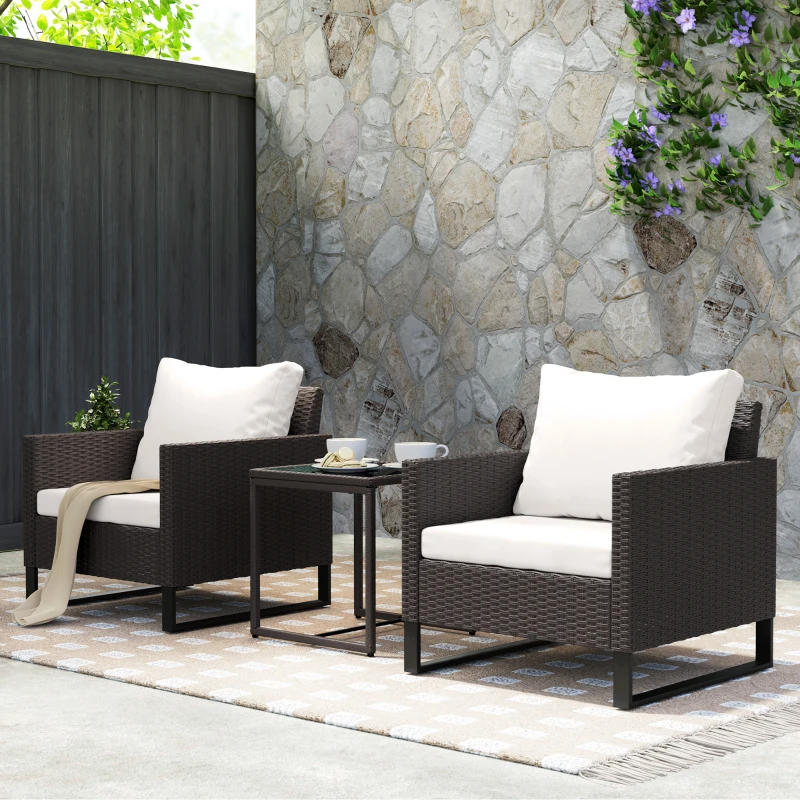 Outsunny 3 Pieces Rattan Bistro Set with 4 Cushions, Wicker Garden Furniture Set, Glass Top Coffee Table and Chairs for Outdoor Patio, Balcony, Terrace and Conservatory, Brown