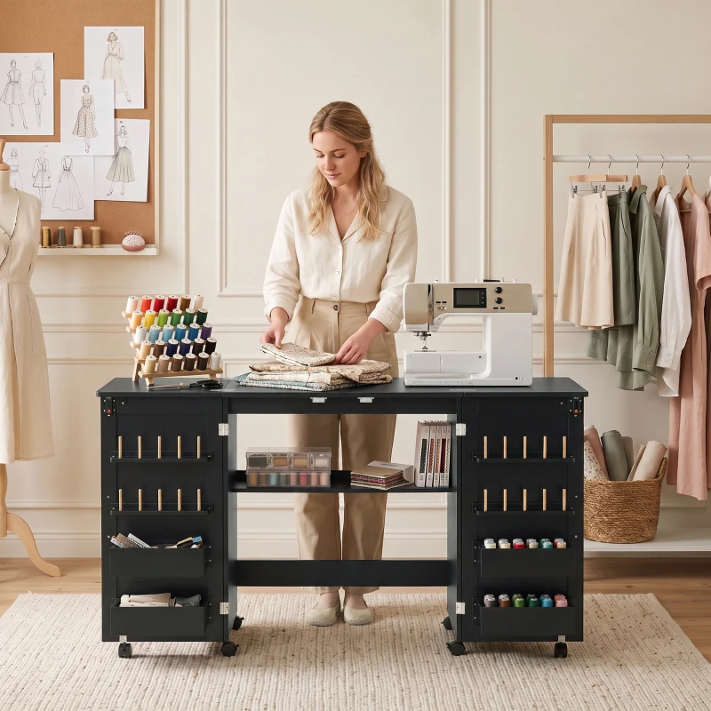 HOMCOM Table de couture pliante, meuble couture à roulettes, 2 portes magnétiques, 4 bacs, 20 crochets, 160x40x83cm, noir