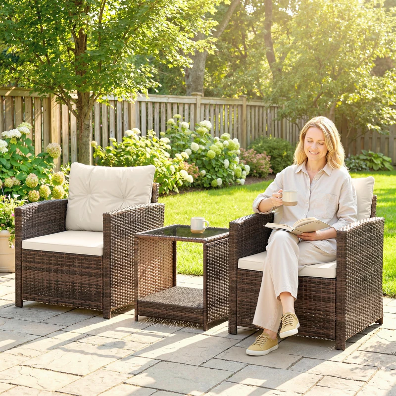 Outsunny Rattan Bistro Set, 3 Piece Garden Furniture Set with 2 Tier Glass Top Table and Cushions, Mixed Brown