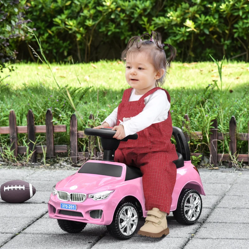 HOMCOM Macchinina per Bambini Cavalcabile con Volante, Fari e Musiche Integrate, Macchina per Bambini in PP e Metallo, 63.5x28x36 cm, Rosa