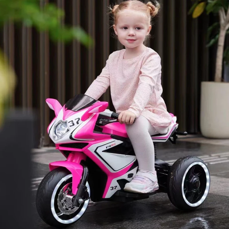 Moto elettrica per bambini, ruote luminose, marcia avanti/indietro e indicatore della batteria in tempo reale, 78,1x40,6x51,5 cm, Rosa