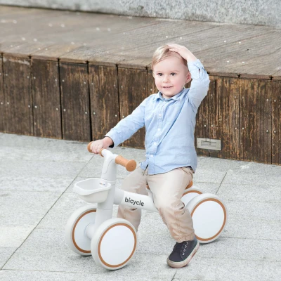 AIYAPLAY Bicicleta sin Pedales para Niños de 12-36 Meses con Asiento Ajustable Cesta y 4 Ruedas Silenciosas 56x27x39 cm Blanco