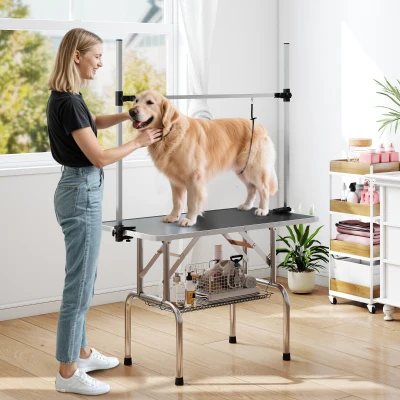 PawHut Table de toilettage pour chien pliable usage à domicile potence inox réglable et panier 107 x 60 x 164 cm noir