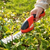 Outsunny Taille haie - mini taille haie portable avec batterie rechargeable - clé de sécurité, 2 lames - vitesse à vide 1100 tr/min - acier ABS rouge noir(m-2)