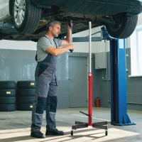 HOMCOM Gato de foso hidráulico, gato de elevación 500 kg, con ruedas pivotantes y pedal, acero, 58 x 58 x 110-191,5 cm rojo(m-2)