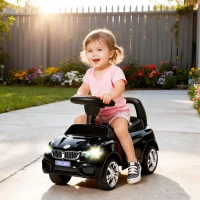 HOMCOM Carro Andador para Crianças com Faróis Música Buzina Volante Compartimento de Armazenamento 63,5x28x36 cm Preto(m-2)