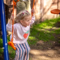 Outsunny Four-In-One Metal Garden Swing Set, with Double Swings, Glider, Slider, Ladder - Orange and Blue(m-12)
