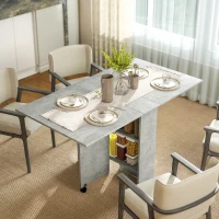 HOMCOM Mesa de Cocina Plegable con Ruedas 2 Estantes de Almacenaje y 2 Alas Abatibles Estilo Moderno 75x140x74 cm Gris Cemento(m-2)