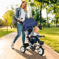 HOMCOM Tricycle 6 en 1 pour enfants, poignée de poussée, siège réversible, panier, auvent, ceinture de sécurité, 1-5 ans, bleu(m-10)