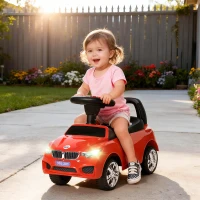 HOMCOM Coche Correpasillos para Niños de 18-36 Meses con Faros Música Bocina Volante Espacio de Almacenaje y Asa Rojo(m-2)
