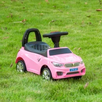 HOMCOM Macchinina per Bambini Cavalcabile con Volante, Fari e Musiche Integrate, Macchina per Bambini in PP e Metallo, 63.5x28x36 cm, Rosa(m-10)