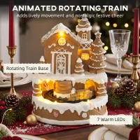 HOMCOM Christmas Gingerbread House, Lighted Musical Snow Village with Rotating Train, LEDs, Tunes, Battery Operated(m-5)