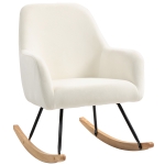 Fotel bujany z podłokietnikami, drewniane kufe, sypialnia